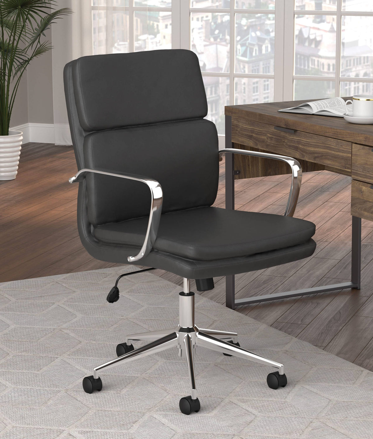 Work in modern comfort and style with this office chair. - 801765 Pie's Variety Store