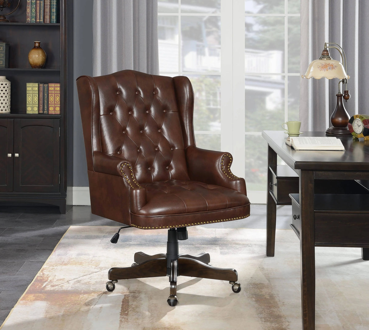 this traditional office chair is fit for a CEO. Its distinguished design begins with a comfortably padded seat wrapped in smooth