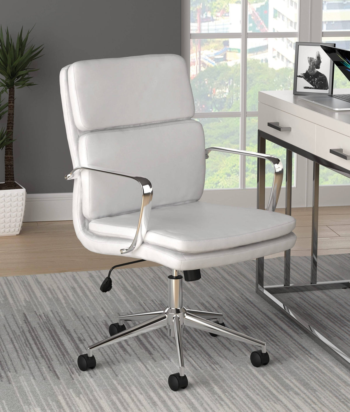 Work in modern comfort and style with this office chair. - 801765 Pie's Variety Store