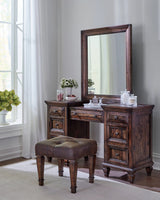 Avenue Upholstered Tufted Vanity Stool Weathered Burnished Brown It features a rich weathered burnished brown finish with wood grain details. - 223039 coastmega