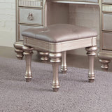 Upholstered Vanity Stool Metallic Platinum Its metallic finish and highlight glaze create a glamorous effect. - 204189 coastmega