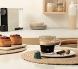 Nespresso Buenos Aires Lungo Coffee Capsules is a fragrant and balanced blend of washed Colombian Arabica that adds delicate fruit acidity and lightly fried Ugandan Robusta that adds malty cereals and sweet notes of popcorn to the mix - NESC-135-0296 Pie's Variety Store