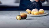 Nespresso Buenos Aires Lungo Coffee Capsules is a fragrant and balanced blend of washed Colombian Arabica that adds delicate fruit acidity and lightly fried Ugandan Robusta that adds malty cereals and sweet notes of popcorn to the mix - NESC-135-0296 Pie's Variety Store